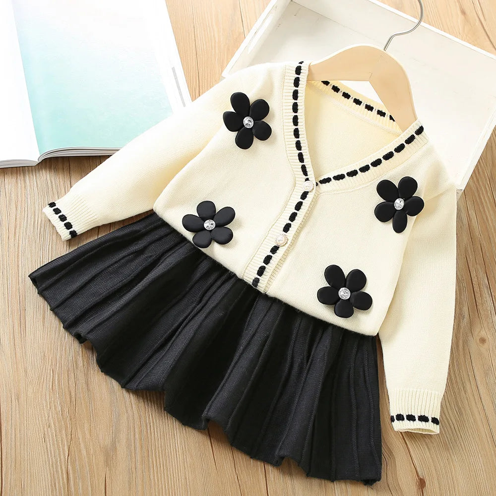 Vanessa Floral Knitted Cardigan and Pleated Skirt Set in cream with black flower appliques, three chic colors.