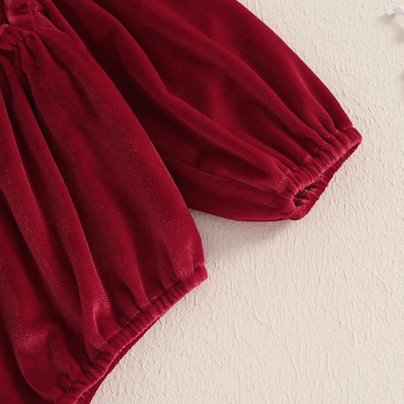Detail of the puffed sleeve of the deep red Velvet and Frills Holiday Baby Bubble Set, demonstrating the soft velvet material for comfort.