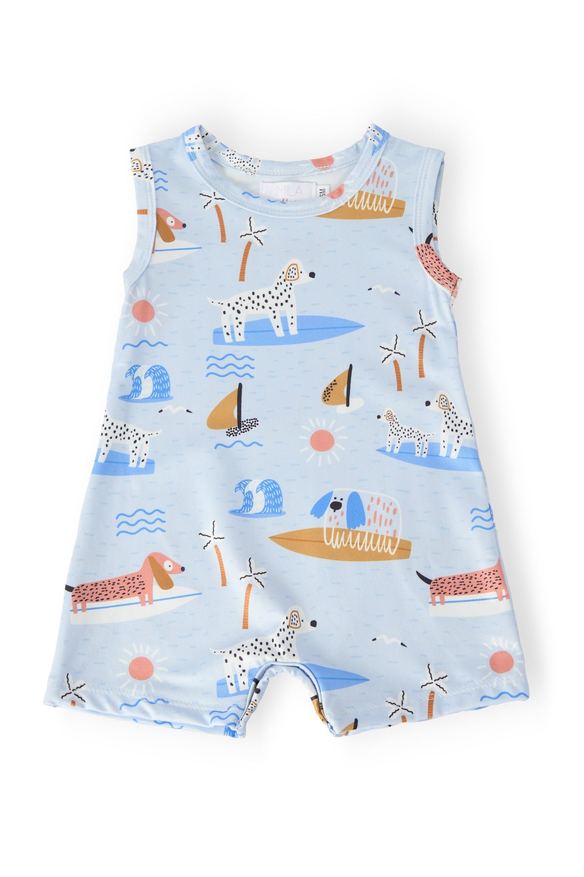 Children's romper with dog and boat pattern on a light blue background