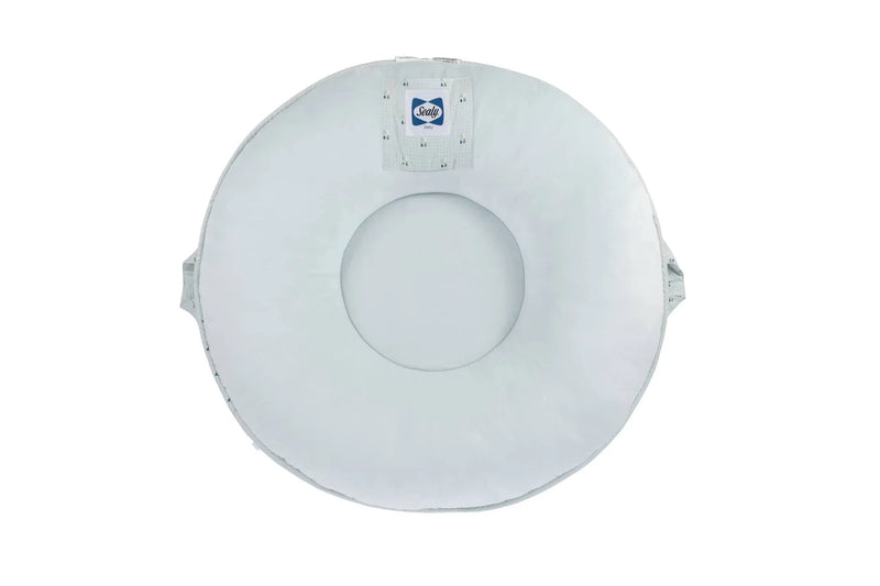 White Sealy floor cushion made of soft fabric with handles on sides for easy carrying