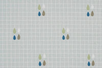 Light gray cotton Sealy floor cushion with subtle grid pattern and small colored teardrop designs
