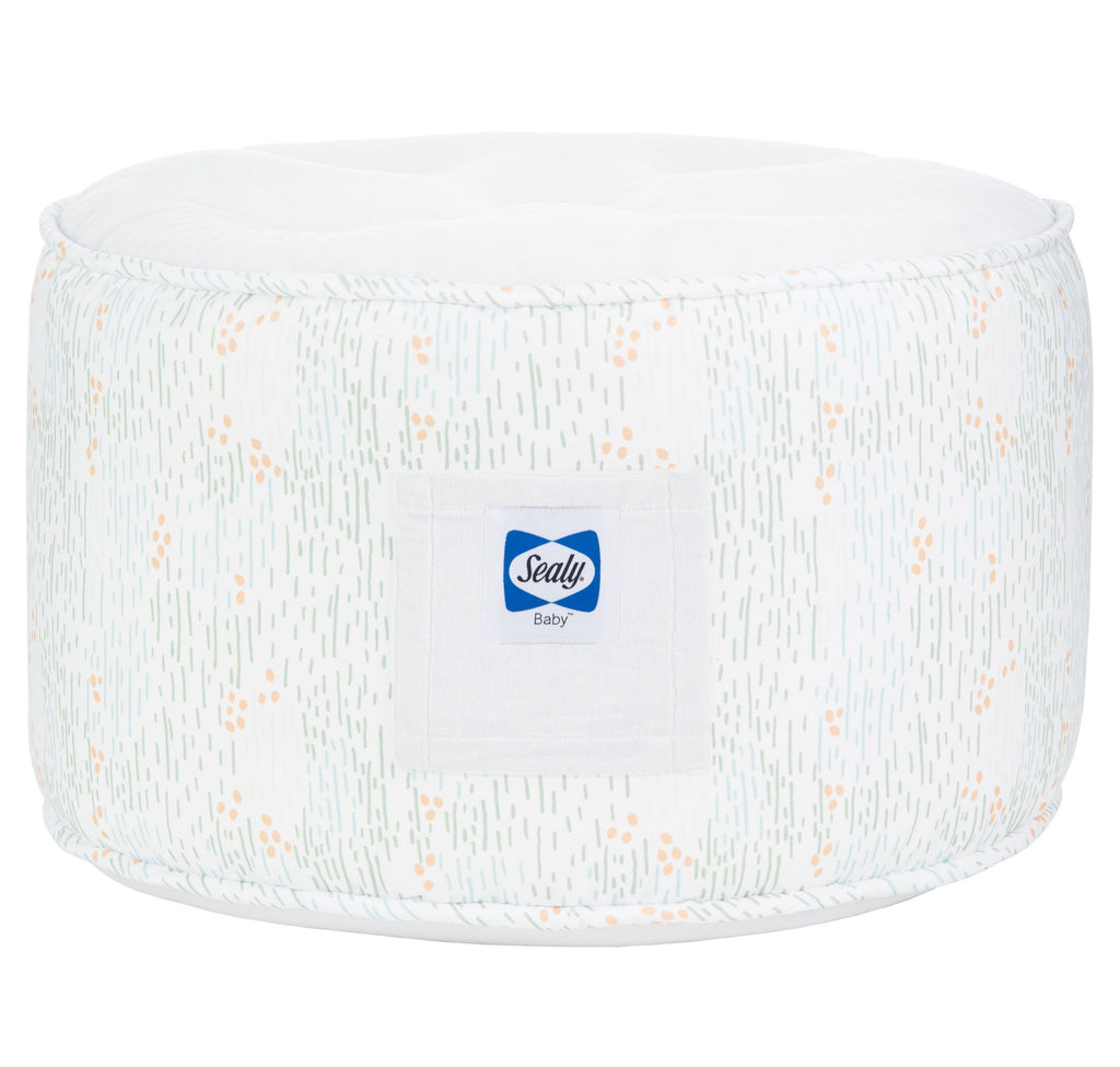 Sealy Pouf - Spring Gray for Toddlers + Kids, featuring a cozy round design with a stylish pattern suitable for children's rooms.