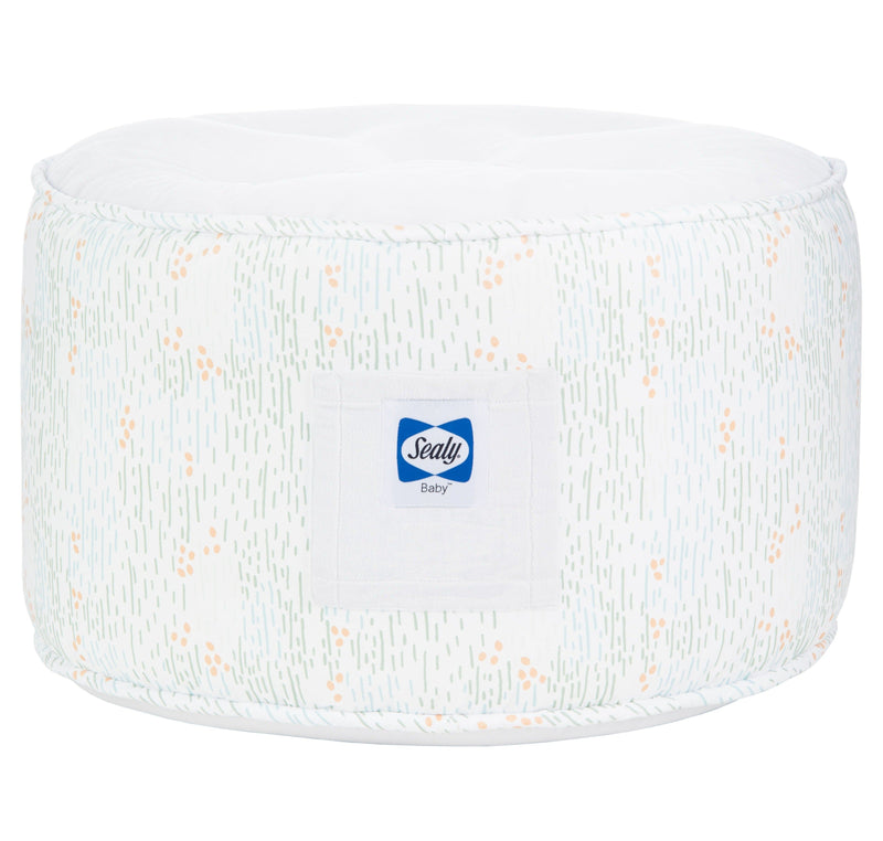 Sealy Pouf - Spring Gray for Toddlers + Kids, featuring a cozy round design with a stylish pattern suitable for children's rooms.
