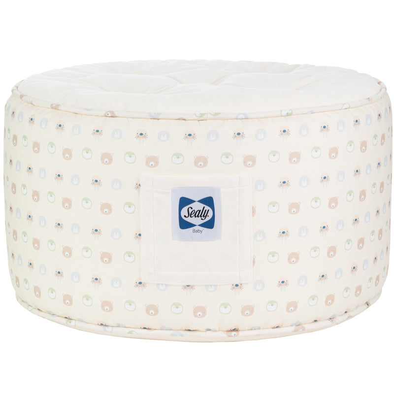 Sealy Pouf - Beige Animal Faces for Toddlers & Kids nestled in a cozy setting, perfect for imaginative play and relaxation.