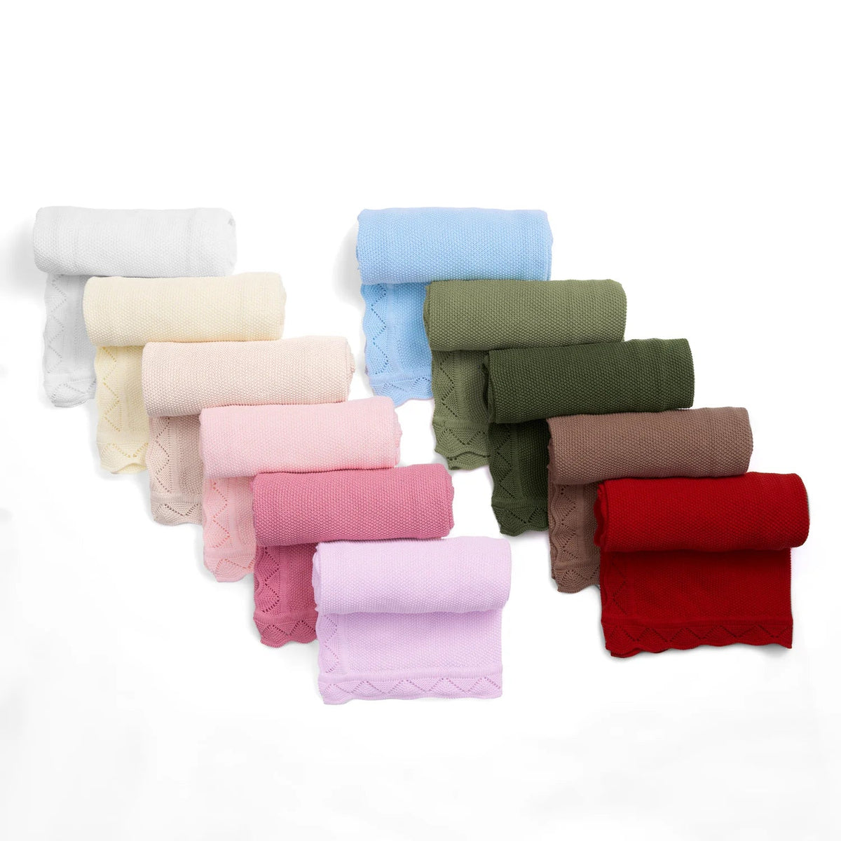 Set of 100% cotton lace-knit baby blankets in white and soft pastels, neatly rolled on a white background.
