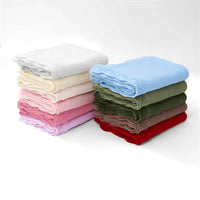 Heirloom Lace Knit Baby Blankets in multiple colors, crafted from 100% cotton.