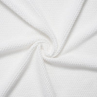 White heirloom lace knit baby blanket, 100% cotton for gentle warmth and newborn keepsake.