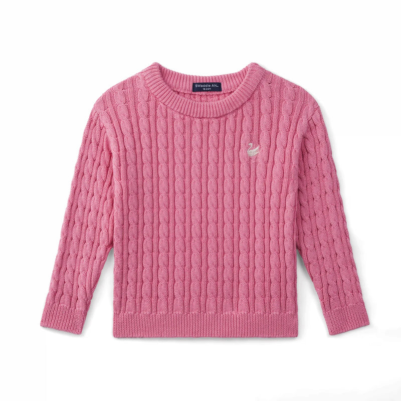 Rose pink cable knit baby sweater flat lay with ribbed cuffs and white swan embroidery