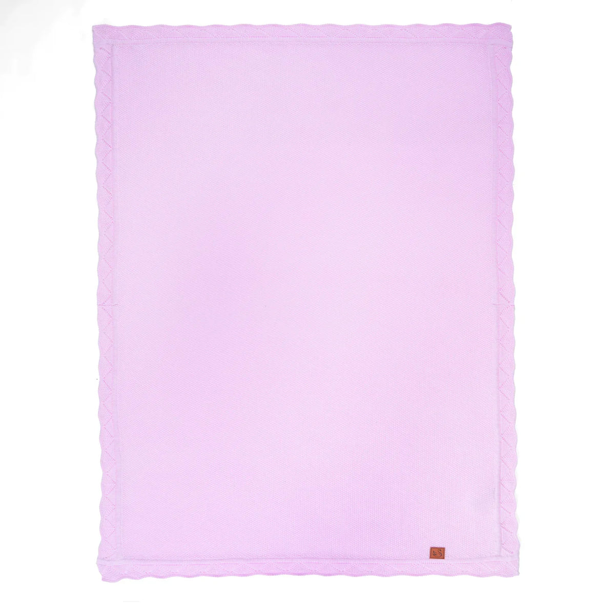 Flat lilac waffle-knit blanket showing lace edging and corner leather tag