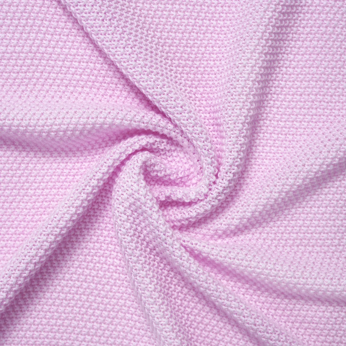 Extreme close-up of draped lilac fabric emphasizing waffle-knit weave pattern