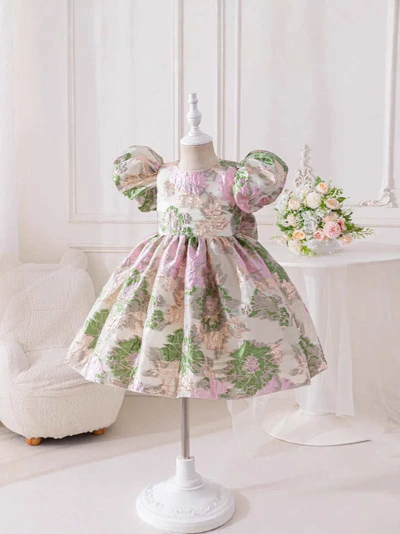 Jacquard Pamela Princess Puff Flowers Dress on mannequin; multicolor floral pattern with pink and green hues.