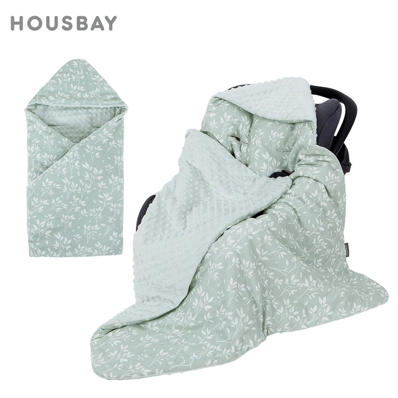 Adorable Ultra-Soft Baby Swaddle Blanket in a floral design, shown draped over a car seat, perfect for providing warmth and comfort to your baby.