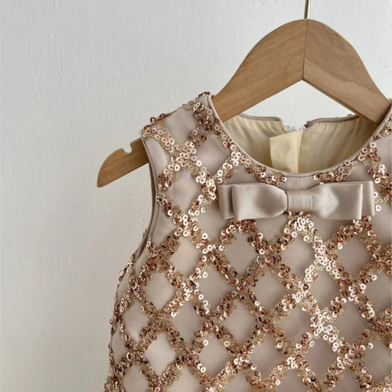 Stylish front view of the Isabella Elegant Sequined Dress for Little Girls in beige, showcasing the elegant design and tulle hem.