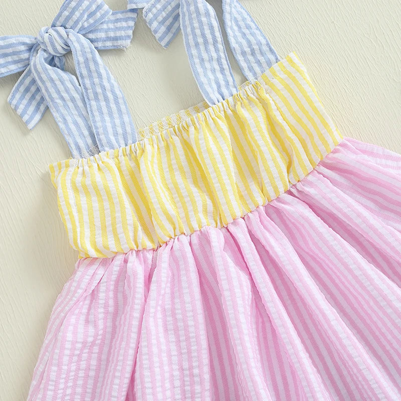 Close-up of the Sweet in Sun Seersucker 2 PC Shorts Set, showcasing the blue and yellow striped bodice with tie straps, ideal for stylish summer wear for little girls.