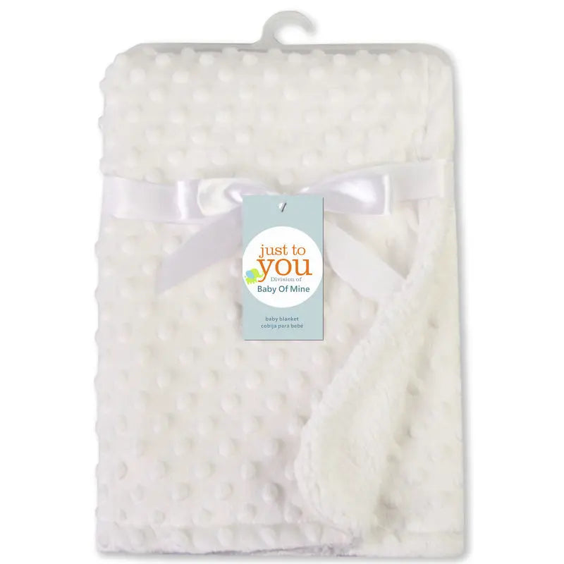 White soft fleece baby blanket for swaddling, 100x70 cm, solid bedding set, packaged with ribbon.