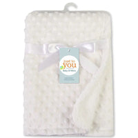 White soft fleece baby blanket for swaddling, 100x70 cm, solid bedding set, packaged with ribbon.
