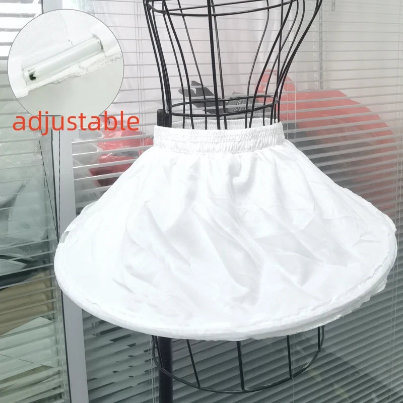 Girl's adjustable off-white short crinoline petticoat underskirt displayed on a dress form.