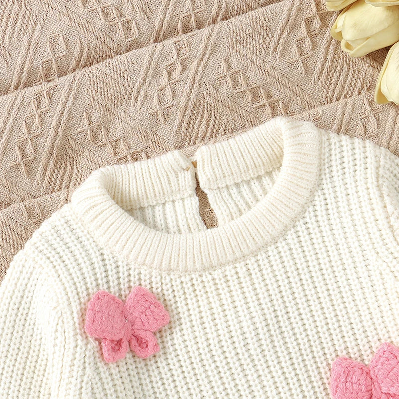 Close-up view of the neckline of the Little Bow Peep Crocheted Knit Baby Romper, emphasizing quality details of this knit baby outfit.