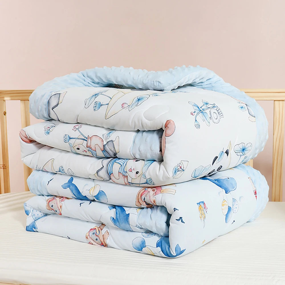 Quilted 120x150 cm kindergarten nap blanket with raised dots and prints of panda, whale, bear, elephant, rabbit.