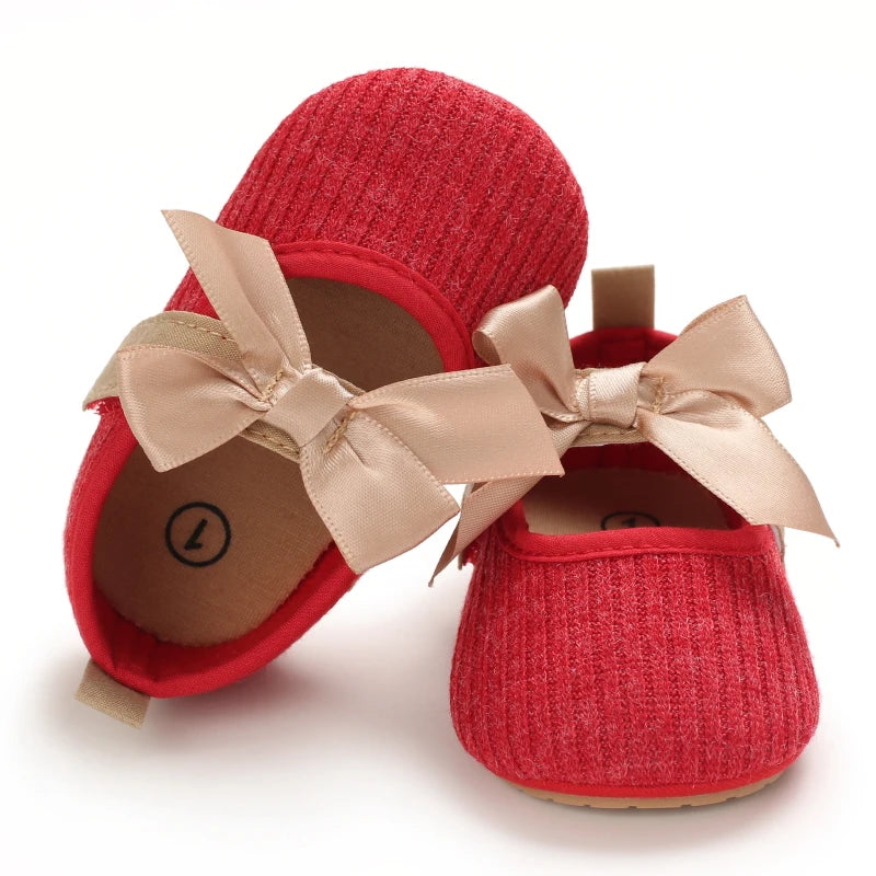 Baby Jane Satin Bow Baby Shoes in red, featuring an elegant satin bow, perfect for special occasions.
