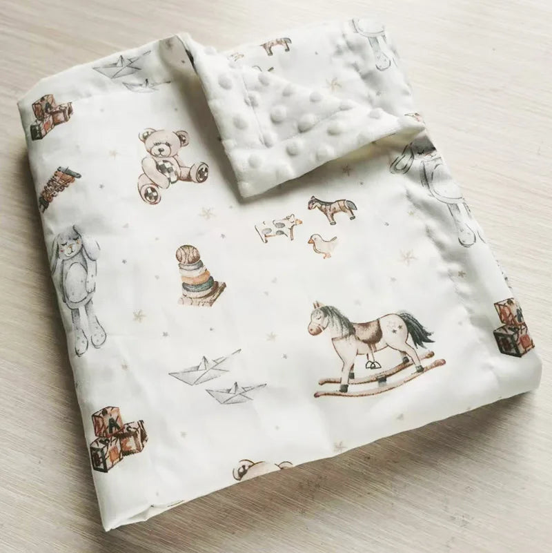 Vintage toy and animal print minky baby blanket, 100x75cm, ultra-soft dotted fabric safe for sensitive skin, perfect nursery gift.