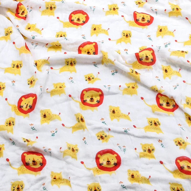 Two-layer bamboo cotton baby swaddle blanket with yellow lion pattern on white background.