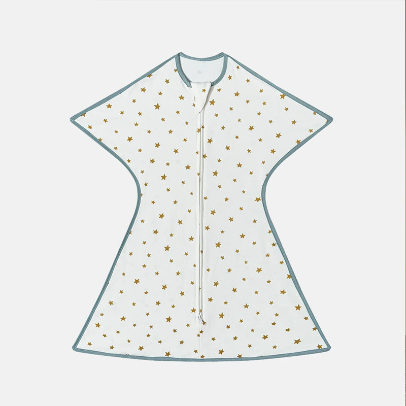 Bright white lightweight baby sleep sack with gold star patterns, designed for responsive baby comfort.