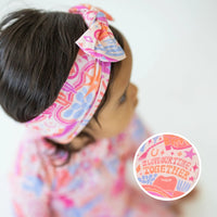 The SoftKnot Bamboo Baby Bow | Saddle Up - Adorable bamboo baby bow in a western-themed design suitable for infants.