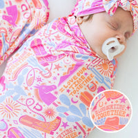The Forever Large Swaddle Blanket in Saddle Up Western theme, perfect for wrapping your baby in comfort.