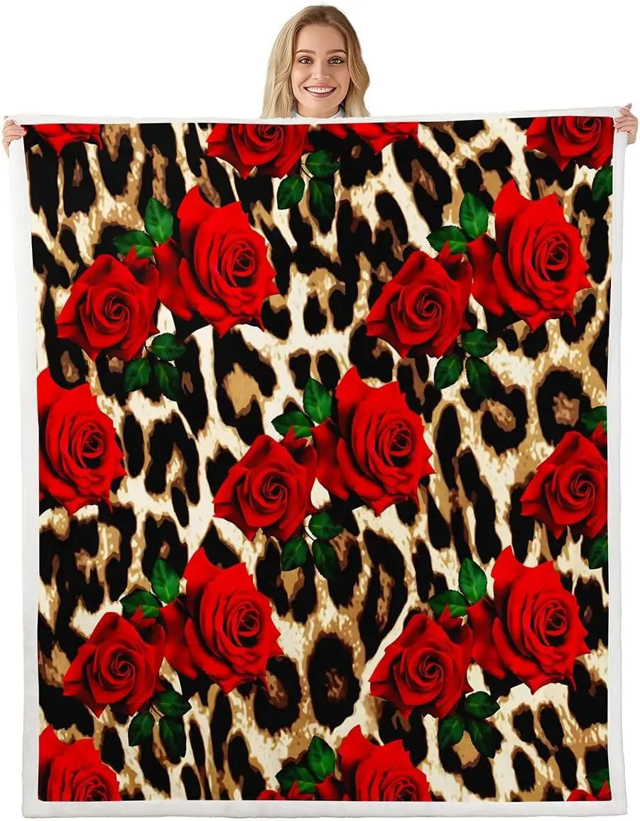 Jungle Rumble double-sided children's blanket with leopard print and red roses design.