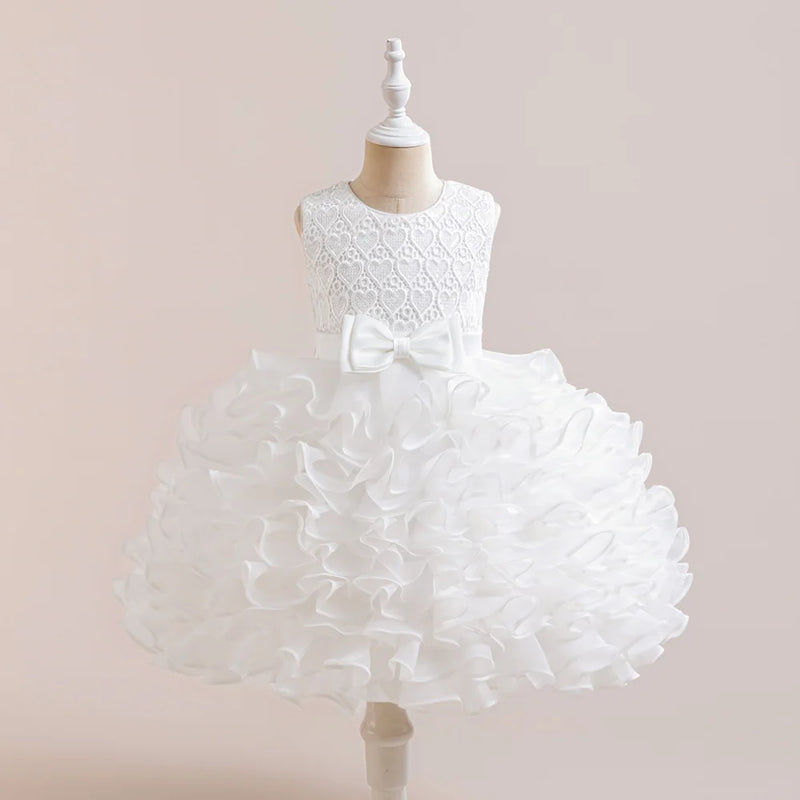 Classic white 'Evengaline' Tulle Tiered Dress for Girls, designed with a lace bodice and layered tulle ruffles for stylish beauty.