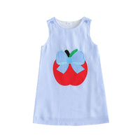 Blue striped seersucker sleeveless dress for girls knee-length with embroidered red apple patch and blue bow.