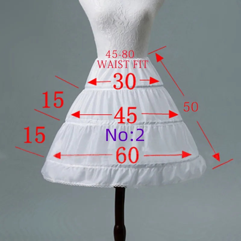 White children's petticoat underskirt on a dress form with measurement arrows, displaying six styles.