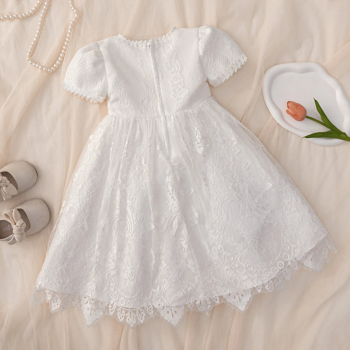 Tabitha Elegant Baptism Flower Girl Dress with pink waist accent, lace bodice, short embroidered sleeves, back zipper.