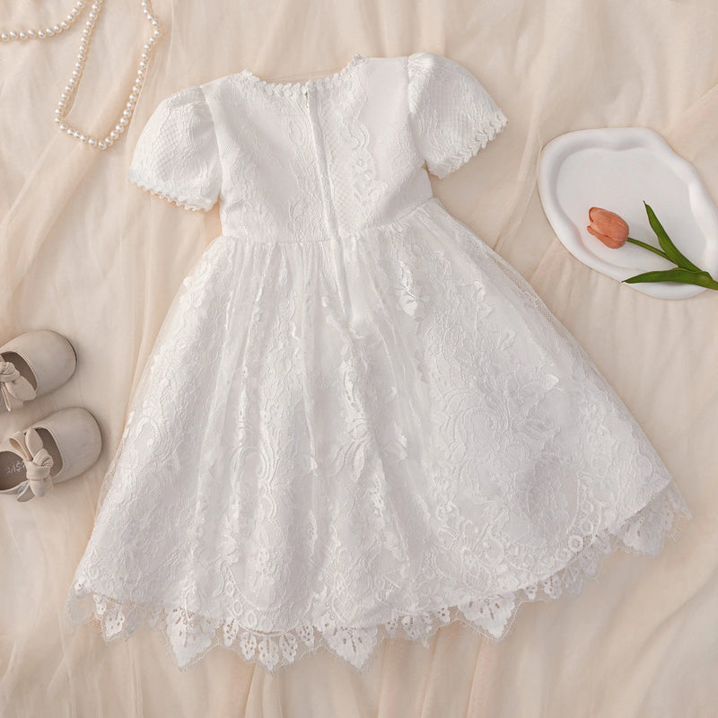 Tabitha Elegant Baptism Flower Girl Dress with pink waist accent, lace bodice, short embroidered sleeves, back zipper.