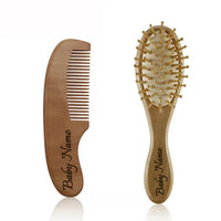 Personalized wooden baby brush and comb set for infants and toddlers with custom name on handles.