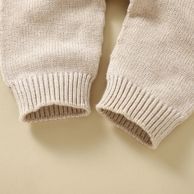 Close-up of the cuff detail on the Nature's Colors Knitted Baby Romper Overalls, ensuring a comfortable fit for baby.