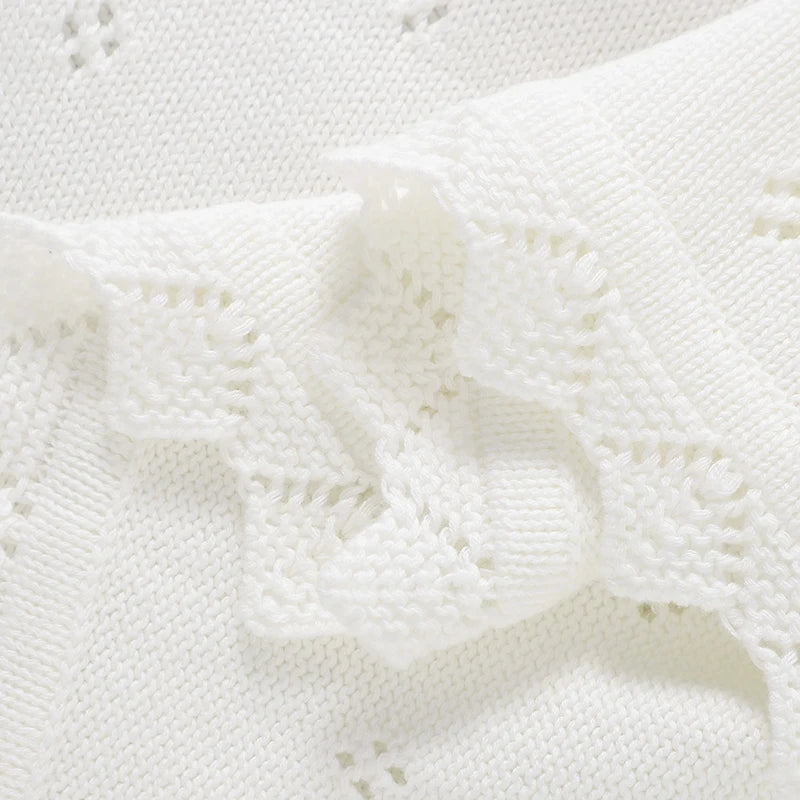 White cotton knit baby baptism blanket with crochet accents, lightweight for christenings.