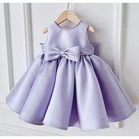 Patience Marie lavender satin girls' dress, sleeveless with beaded neckline and bow at waist, knee-length.