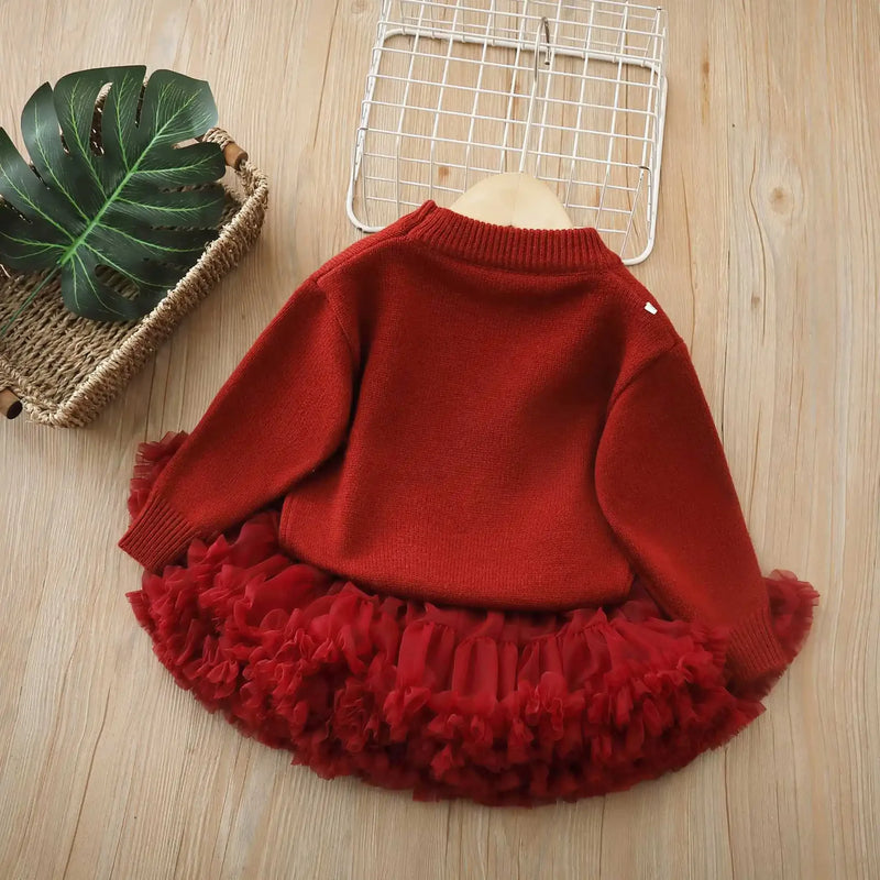 Back view of the Strawberry Girls Knit Sweater and Tulle Skirt - Deep Red, highlighting the cozy knit pullover and fluffy skirt design.