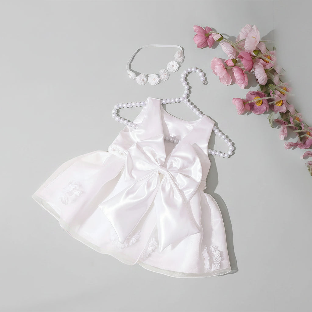 White satin infant dress with oversized bow and matching beaded headband; two-piece special-occasion set in 4 colors.