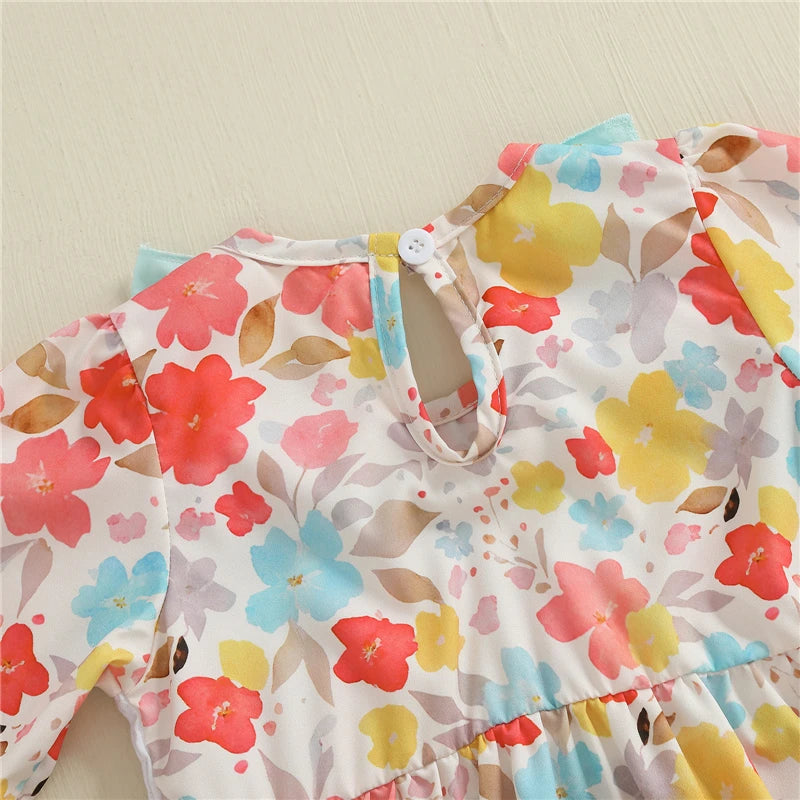 Detail of the back closure of the Fall Fabulous Pumpkin Embroidered Bubble romper, featuring buttons that ensure easy dressing for your little one.