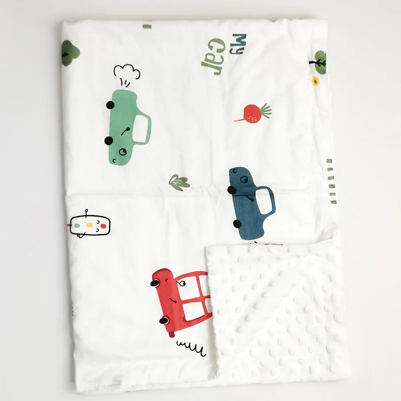 Soft white minky baby blanket featuring colorful cartoon cars and "My Car" text. Ultra-soft, durable polyester-cotton blend perfect for toddlers and sensitive skin.