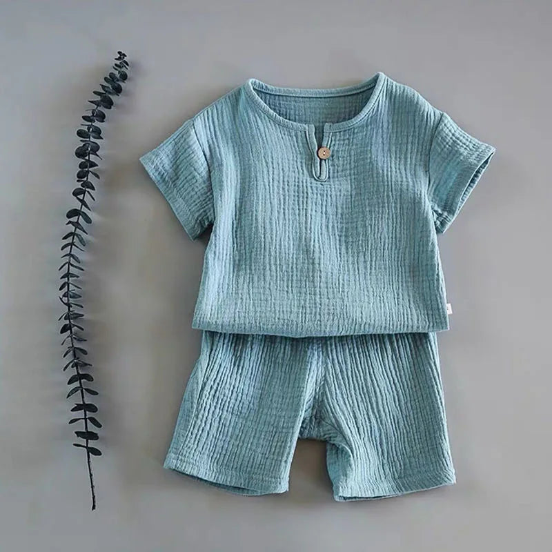Lightweight Children's Cotton Linen Shorts Set featuring a soothing light blue, perfect for warm weather outings.
