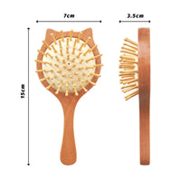 Personalized wooden baby brush for infants; ergonomic handle and round pin bristles.