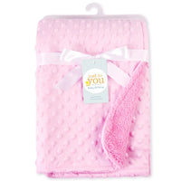 Pink soft fleece baby blanket with dotted texture, 100x70 cm, unisex for ages 0-3 years.