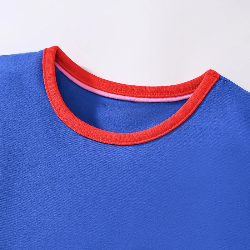 Close-up of the neck area of the 'School Daze' Casual Dress with a bright red trim, designed for comfort and style for young girls.