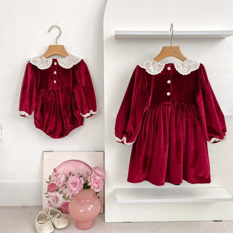 Deck the Halls Smocked Velvet and Frills Sibling Outfits - Deep Red; a cozy velvet romper and dress set showcased together, perfect for coordinating siblings.
