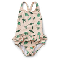 Frilly Prints Sun Protective One-Piece Swimsuit for girls with palm-leaf pattern, crisscross back, and frilly skirt.