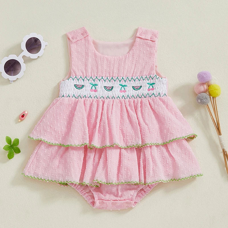 Adorable 'Summer Cutie' Baby Summer Romper featuring a tiered pink design with embroidered fruits and vegetables, perfect for warm weather.